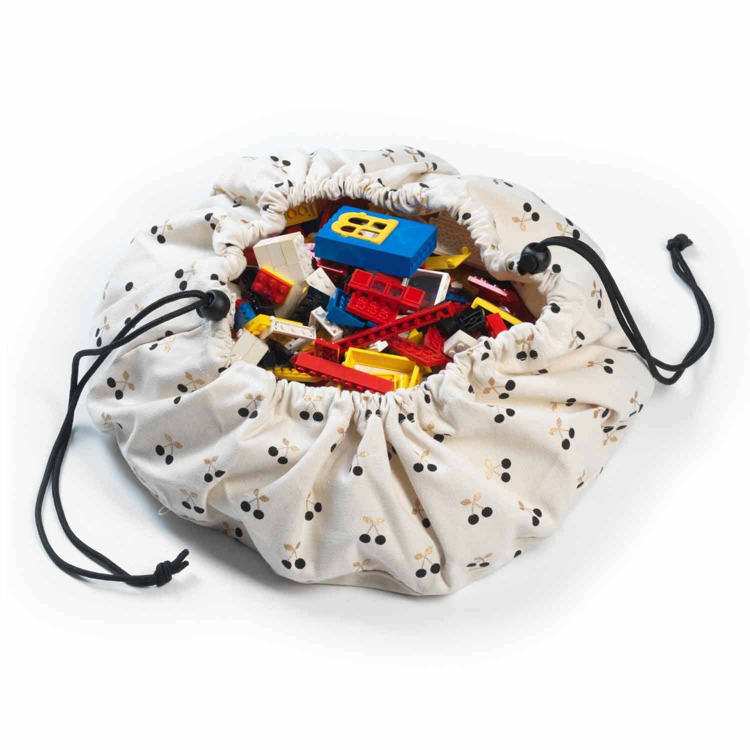 Playandgo Mini Cherry gold storage bag, filled with lego