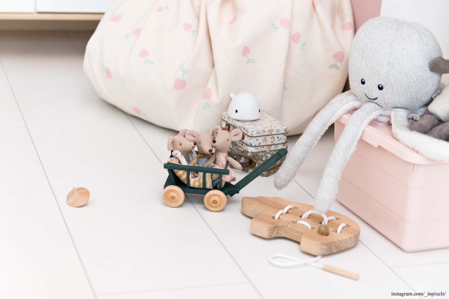 Play&Go storage bag and play mat, print cherry love, kidsroom, toys next to an octopus